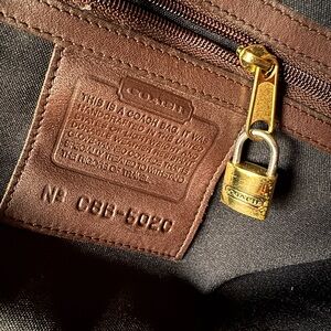 Coach Black and Brown Men's Bag with Gold Accent